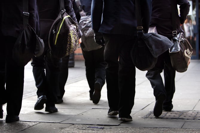 File photo dated 26/01/12 of generic stock picture of pupils. Secondary schools in England will receive Â£1,000 to help support the Covid-19 vaccination programme. Issue date: Monday January 24, 2022.