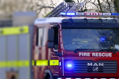 Three crews tackle building fire at Gulworthy