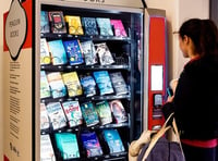 Penguin installs book vending machine at St David's Station in Exeter
