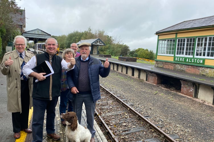 MP Sir Geoffrey Cox, second from left, celebrates go-ahead for Tavistock to Bere Alston rail link reinstatement.