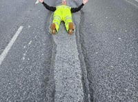 Tavistock's Mr Pothole lies down in crater