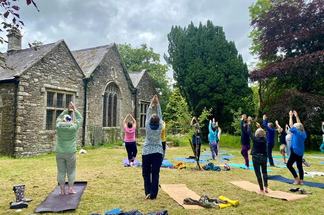 Yoga in Calstock churchyard – part of the event.