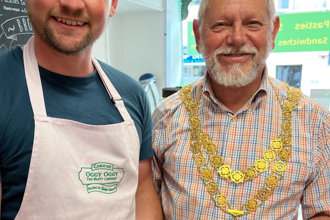 Kenny Lake of Oggy Oggy wins a Tavistock Cream Tea Week award from Mayor Paul Ward