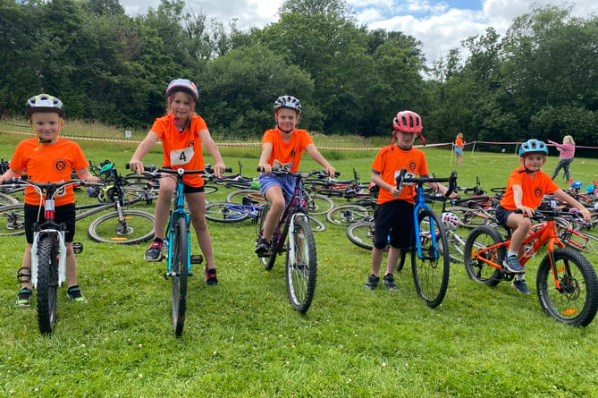 Cyclists take part in the Buckland Monachorum School  triathlon  biking section of the triathlon.