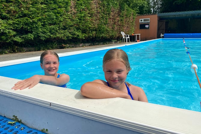 Phoebe and Eliza, both 11, swam to success in the Buckland School triathlon.