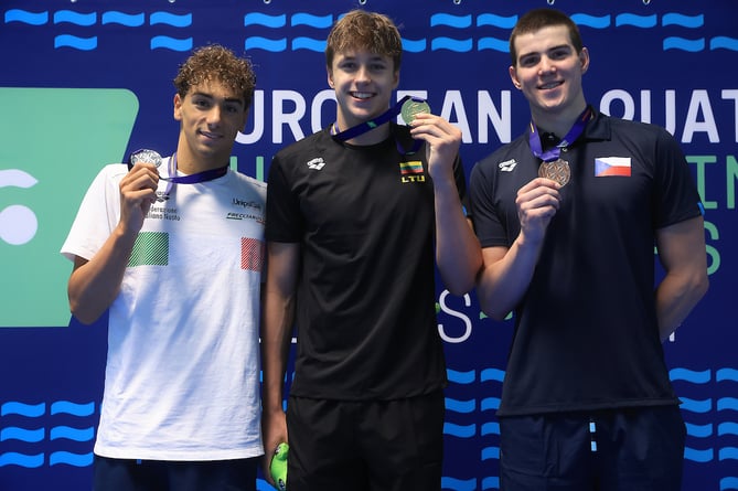 Mantas, 16, centre, of Mount Kelly College, Tavistock, won a European Junior Champion title with gold in the 50m backstroke in a new Lithuanian junior and senior record. He also won and a bronze in the Lithuanian 4x100m mixed medley relay for Lithuania. 