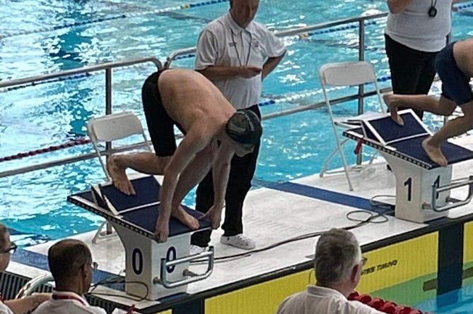 Matthew at the start of a pool event at the Cardiff International open meet