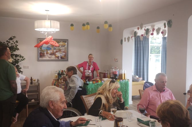 The tiki bar was a hit at the nursing home's summer barbecue