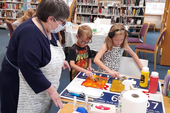 Families are invited to Tavistock Library's Fun Palace event this Saturday. Pictured are children enjoying a previous Fun Palace.